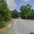 Woman reports man threatening her at home