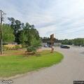 Truck stopped along roadway near Dollar General