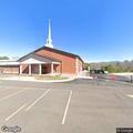 90-year-old woman having breathing trouble at church