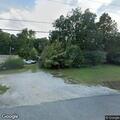 Person injured by tree falling on vehicle at Dollar General