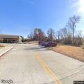 Man having difficulty breathing at racetrack in Adairsville