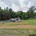 Neighbor dispute over fence damage and trailer