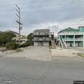 Two juveniles struggle in water near shore but safe
