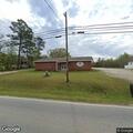 Person experiencing chest pains at church parking lot