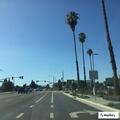 Suspicious man in black near Jack in the Box