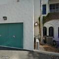 Person sleeping on property near west-end fountain