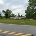 Report of male stalking woman with active warrants