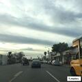 Male slumped over in gray SUV stopped in roadway