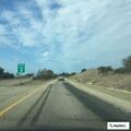 Gray tanker truck swerving on northbound 101