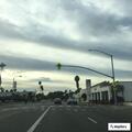 Man hits parked car window with metal object