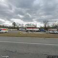 Officer checks suspicious vehicle at gas station