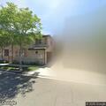 Garage fire with two vehicles under apartment