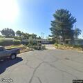 Couch illegally dumped in driveway on Andamar Way