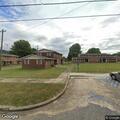 Person with difficulty breathing and vomiting in apartment