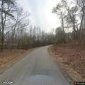 Downed power line blocking rural roadway