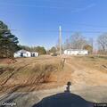 Unresponsive man breathing near County Road 126 in New Albany