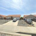 Person experiencing chest pain at Desert Rose Drive