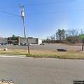 Traffic stop of red Range Rover at Dollar General