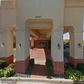 Suspicious person near vehicles at hotel parking lot