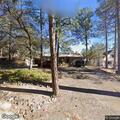 Stepson trespass dispute at Highland Avenue home