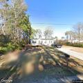 Person with backpack reported in driveway