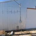 Window of parked semi truck reported damaged