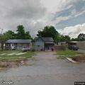 Caller reports possible trespasser behind house