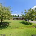Men yelling in yard at Country Club Road home