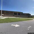 70-year-old man falls, hits head at school field house