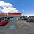 Officer checking on woman at Circle K