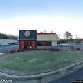 Crash between truck and car at Burger King