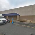 Person with abdominal pain and vomiting at Lowe's