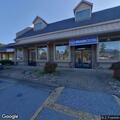 Person experiencing chest pain at dog food store