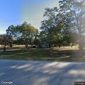 Suspicious white jeep left in yard at residence