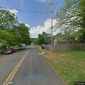 Improperly parked vehicle blocking lane on McLemore