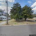 Loose dog reported in yard on Sloan Street