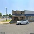 Unconscious patient reported near South Poplar Street