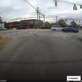 Traffic stop involving black Charger at intersection