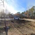 Woods fire threatens structures on County Road 255