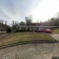 Caller reports person barking in driveway