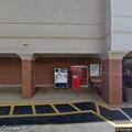 Person slumped at wheel in vehicle at Woodruff Rd lot
