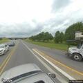 Stalled vehicle blocking traffic at intersection
