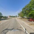 Traffic stop with blue Mini Cooper at intersection