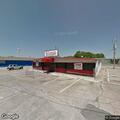 Multiple people fighting in bar parking lot