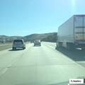 Semi trailer loaded with wood on fire on I-5