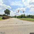 Traffic check on black Ford F-150 at intersection
