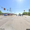 Officer checks silver crossover at intersection