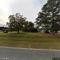 Grass fire at storage building on Cabbage Patch Road