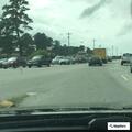 Gray Subaru stopped at East and West Main streets