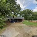 Report of three people in backyard in Heavener